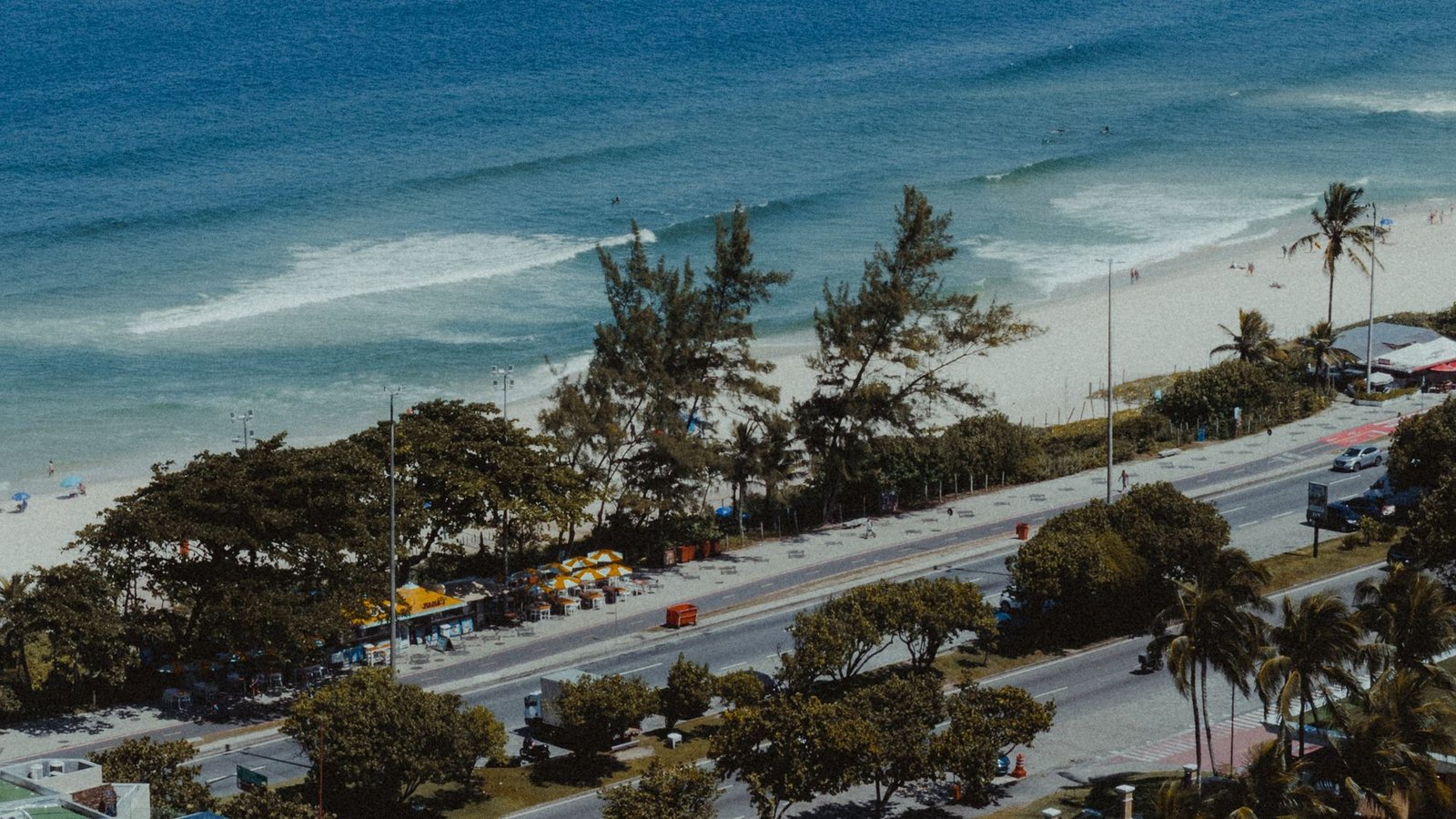 Aerial view of the beachfront avenue and sand in Barra da Tijuca, Rio de Janeiro
