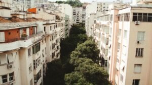 Tree-lined residential street with apartment buildings in Rio de Janeiro